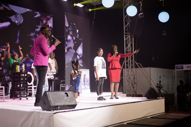 On stage at HIBS Africa, addressing the crowd