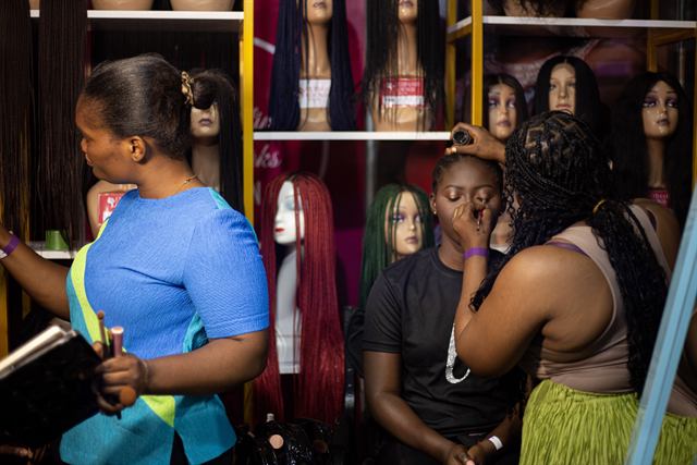 Makeup application at the exhibition booth
