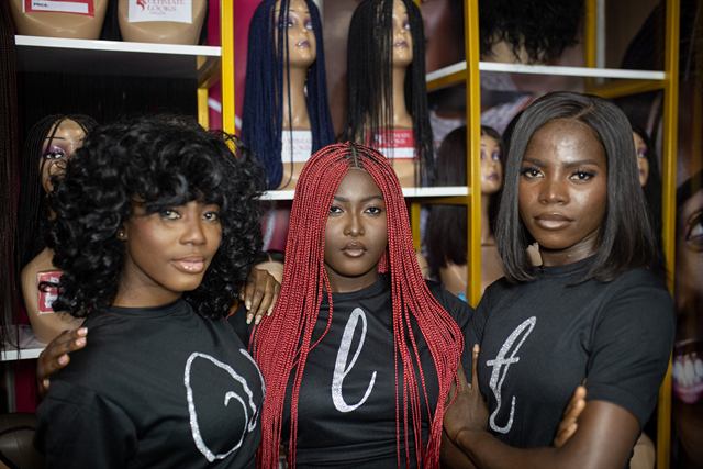 Curly unit, red braids and sleek bob